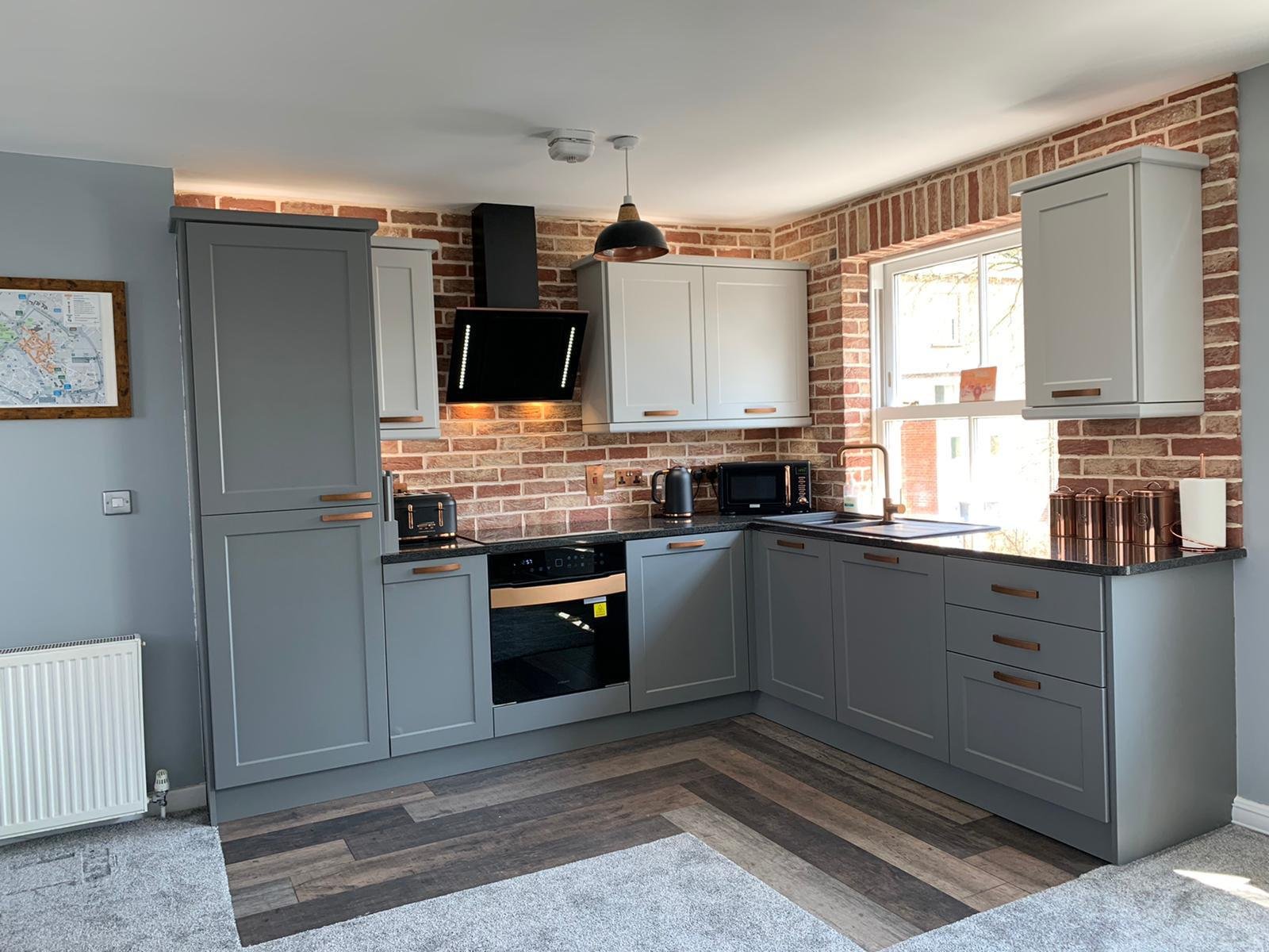 Grey shaker replacement kitchen doors with copper handles